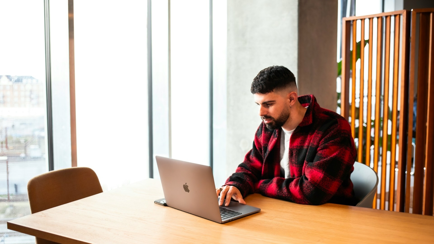 student with a laptop