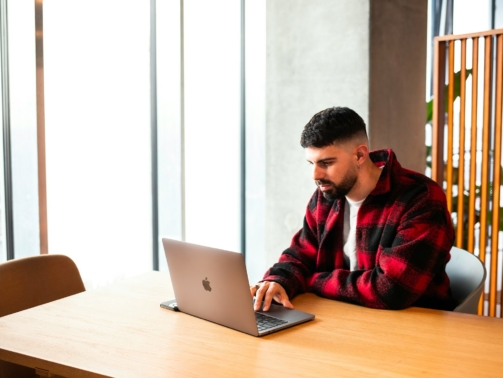 student with a laptop